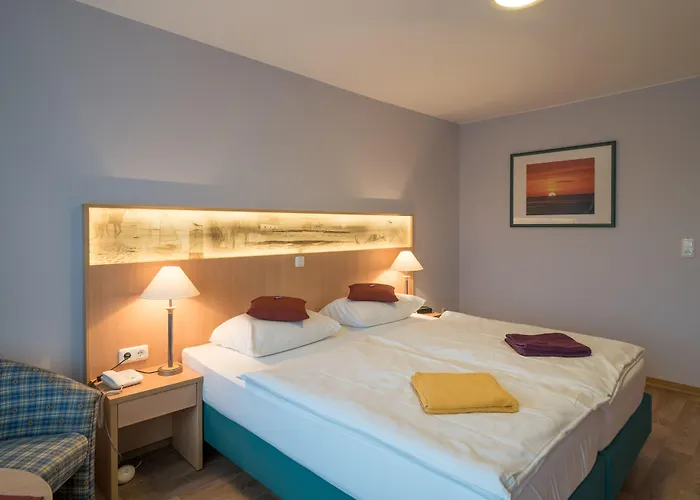 Отель Hotel Spiekeroog Шпикерог